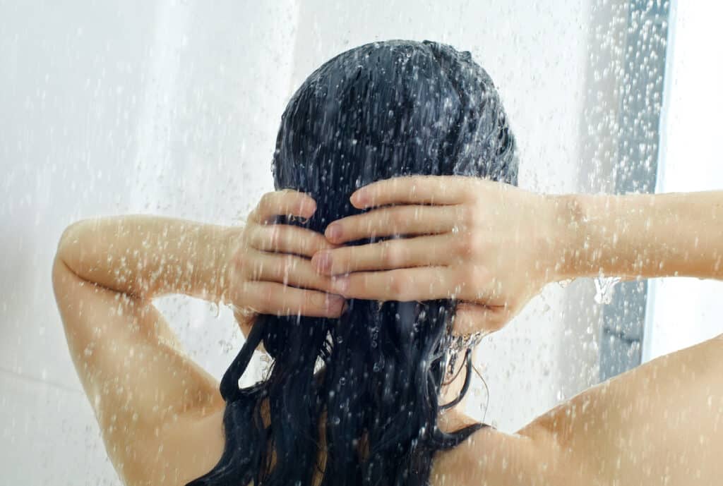 What Happens If You Leave Shampoo In Your Hair? - Beautygab Shampoo being lathered into wet hair