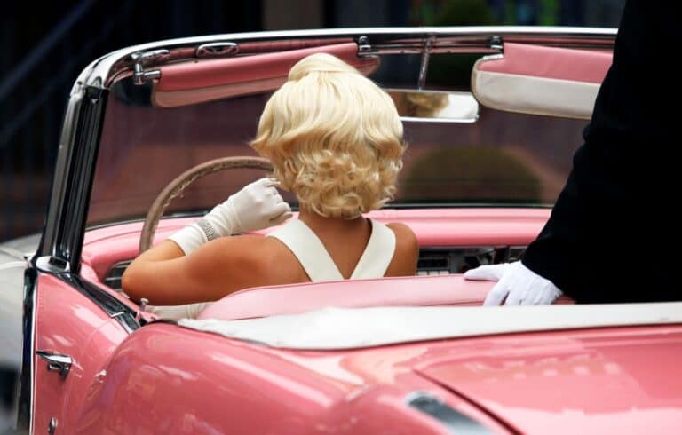 Blonde Marilyn Monroe style wig styled in short vintage curls