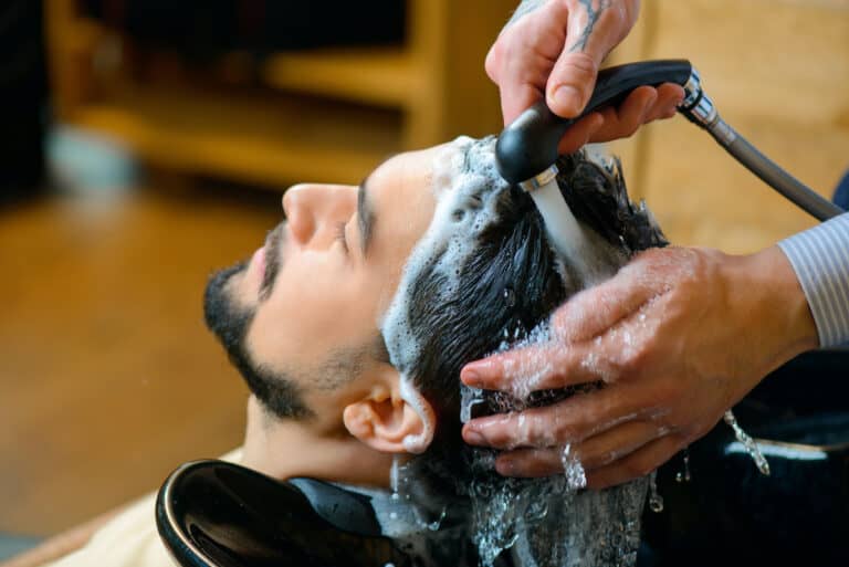 Man At Salon Getting His Hair Washeds