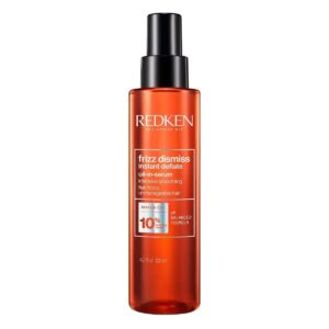 6-27 - Beautygab Redken Frizz Dismiss instant deflate oil serum in an orange spray bottle