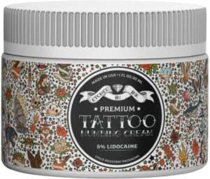 10-9 - Beautygab Etched In Ink premium tattoo numbing cream jar wrapped in a colorful tattoo-print label