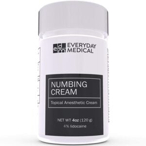 7-23 - Beautygab Everyday Medical numbing cream in a tall white bottle with a black 4% lidocaine label