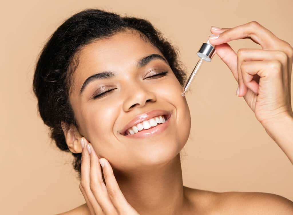 Best Serums For Marionette Lines - Beautygab Woman applying serum along marionette lines