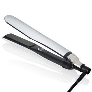 1-5 - Beautygab ghd Platinum+ styler, a white and black flat iron lying on its side