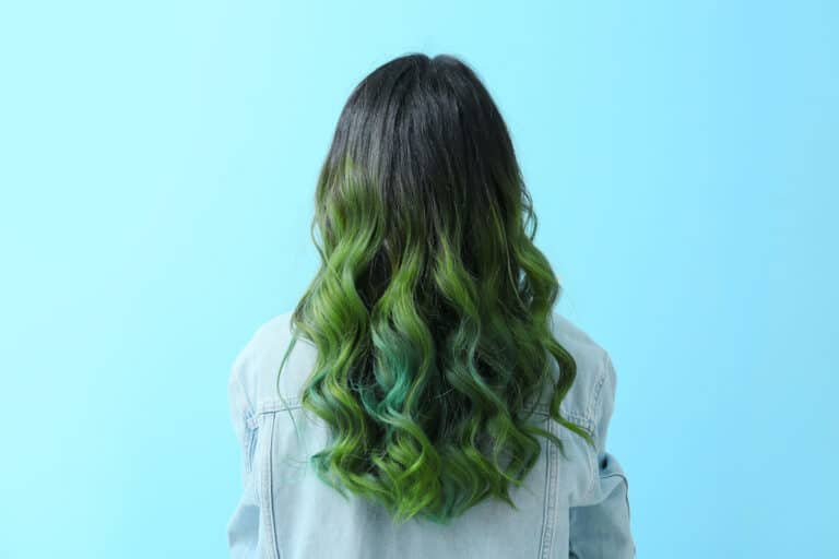 Long hair coloured in a deep olive green shade